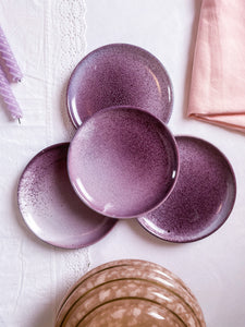4 petites assiettes en poterie