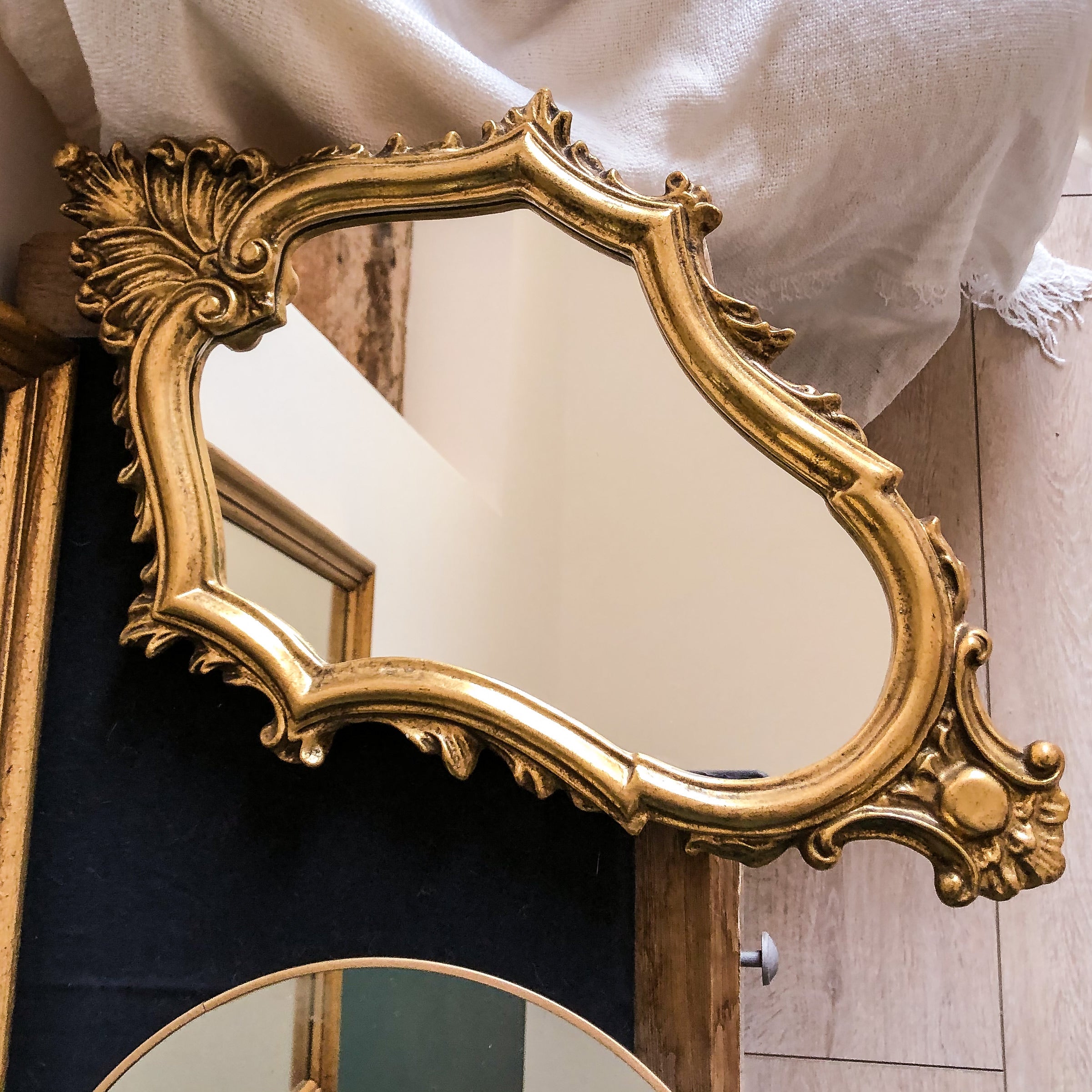 Miroir en bois doré